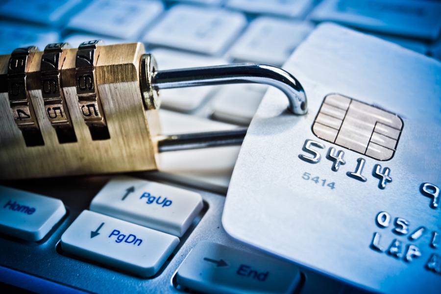 Debit card, lock and keyboard, symbolising security