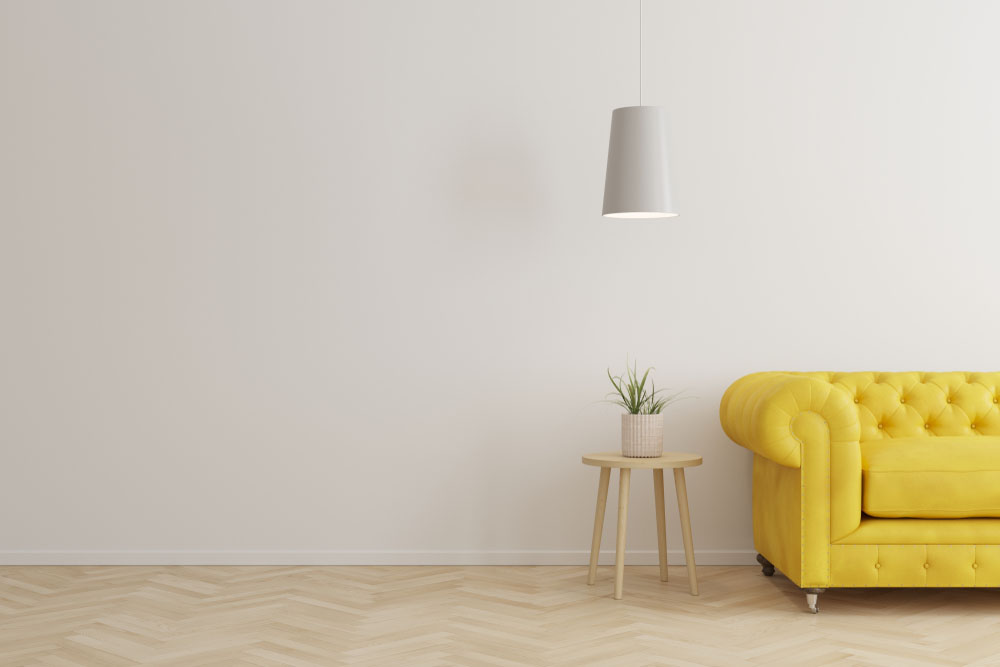 Living room with yellow sofa