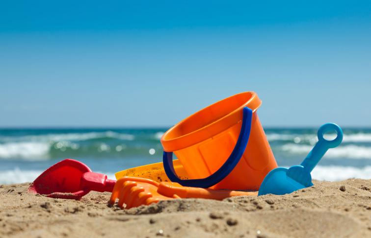 Children's bucket and spade on beach