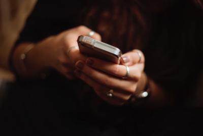 Woman reading her phone