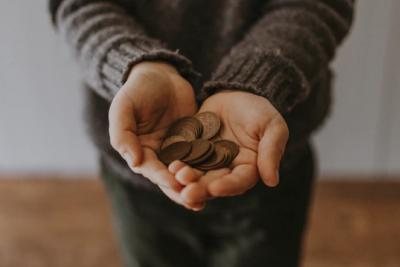 Man holding coins