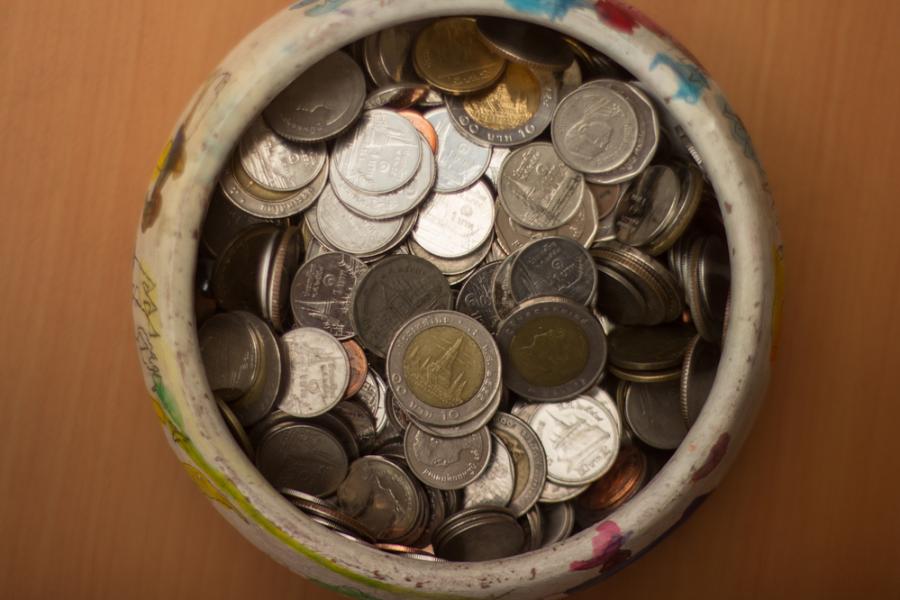 Money jar full of coins